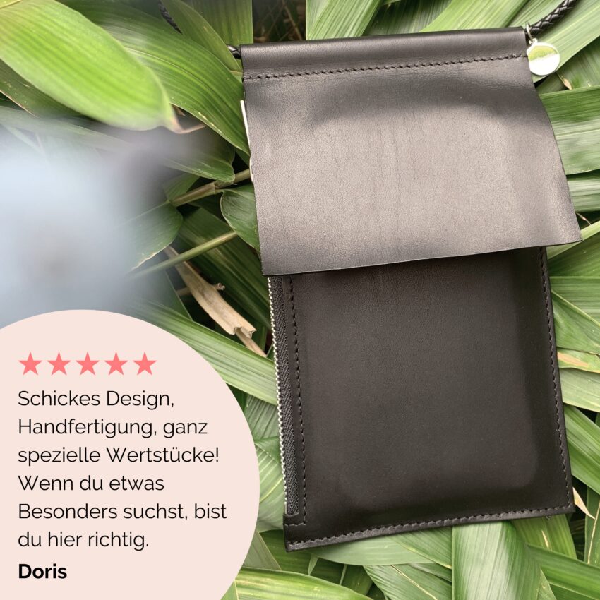 Handtasche aus Leder mit Portemonnaie zum umhängen in schwarz